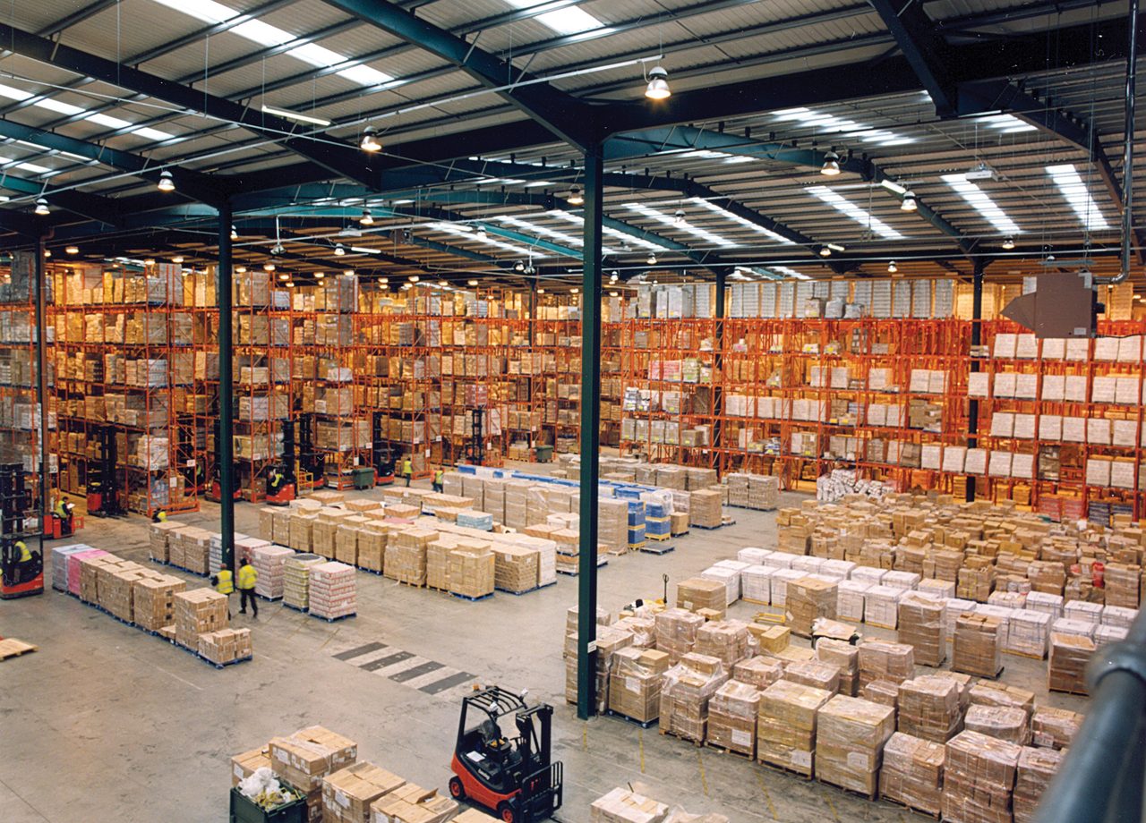Warehouse racking stacked with palletized freight ready for dispatch